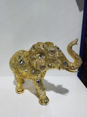 Olifant met steentjes goud